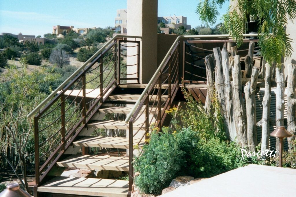 residential stairs concrete tread stair system with steel rails and natural rusty finish