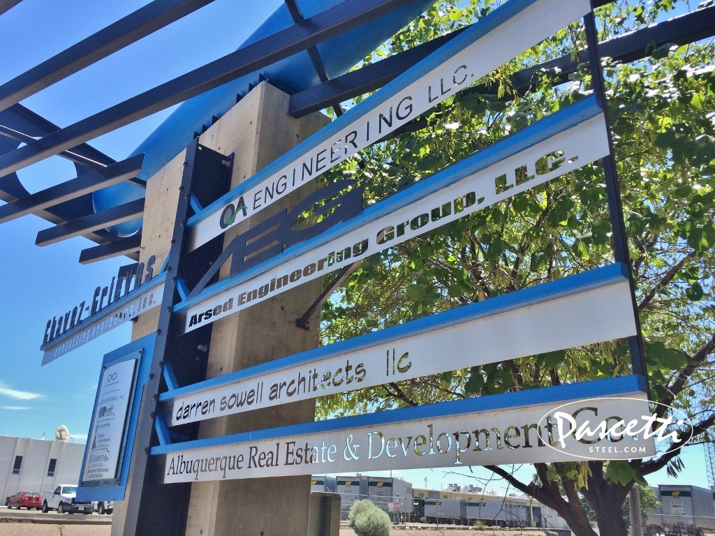 commercial steel shade structure with custom signage